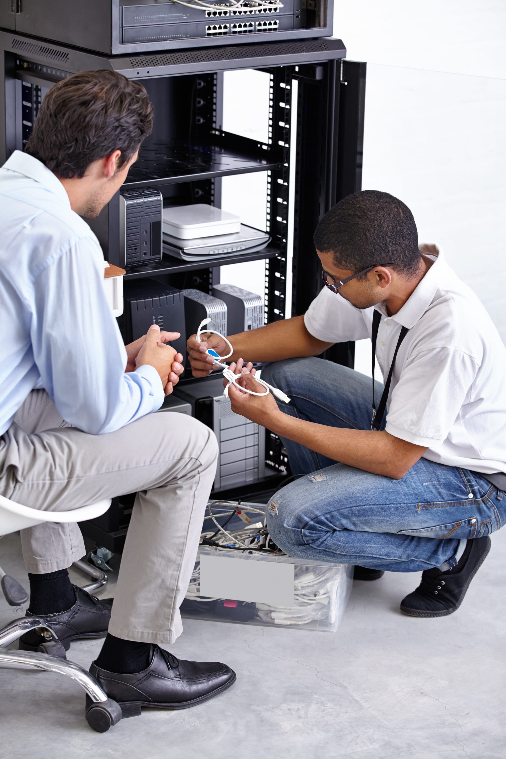 Technician repairing and maintaining IT equipment