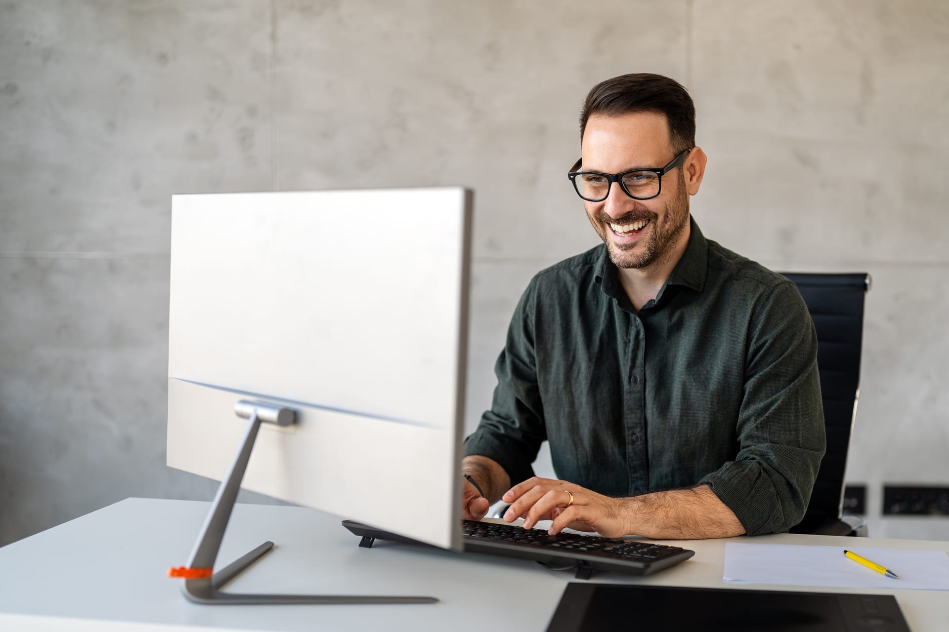 Professional using their workstation in an office